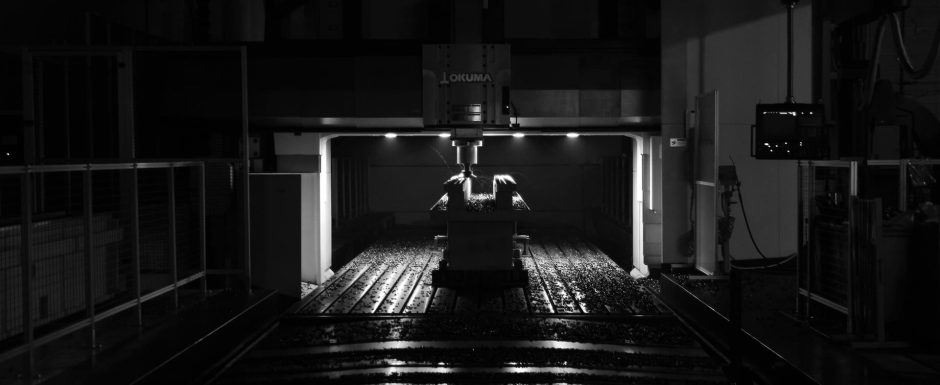 Entrust Okuma lights out machining w logo